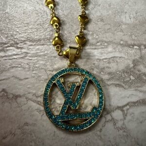 Authentic Louis Vuitton charm on stainless steel chain